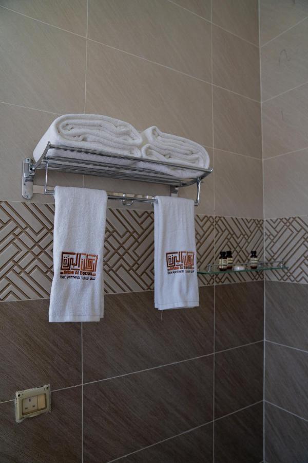 Arkan Al Barzah Hotel Apartment Sur Bagian luar foto